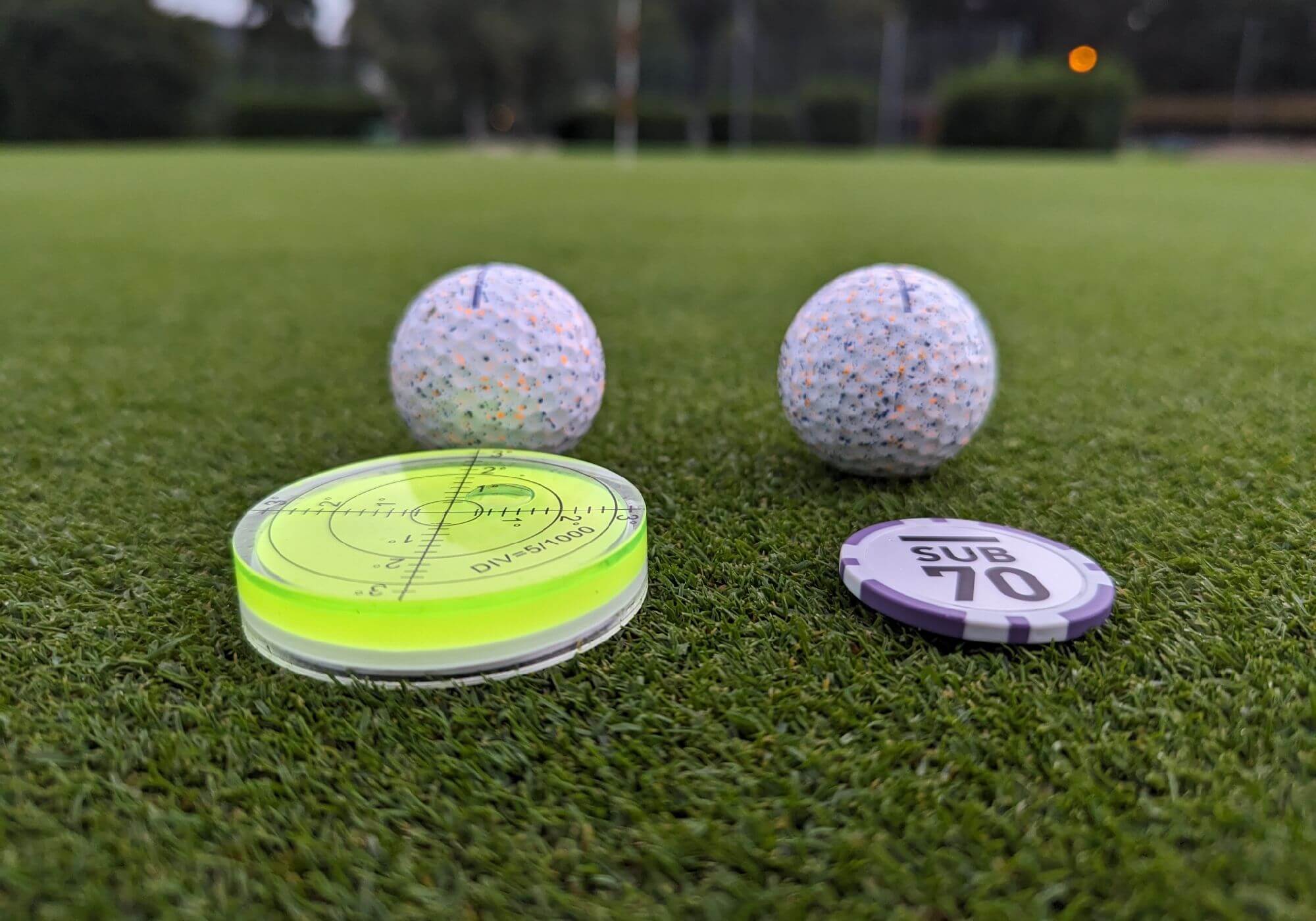 Why You Need a Ball Marker with Level in Your Golf Bag