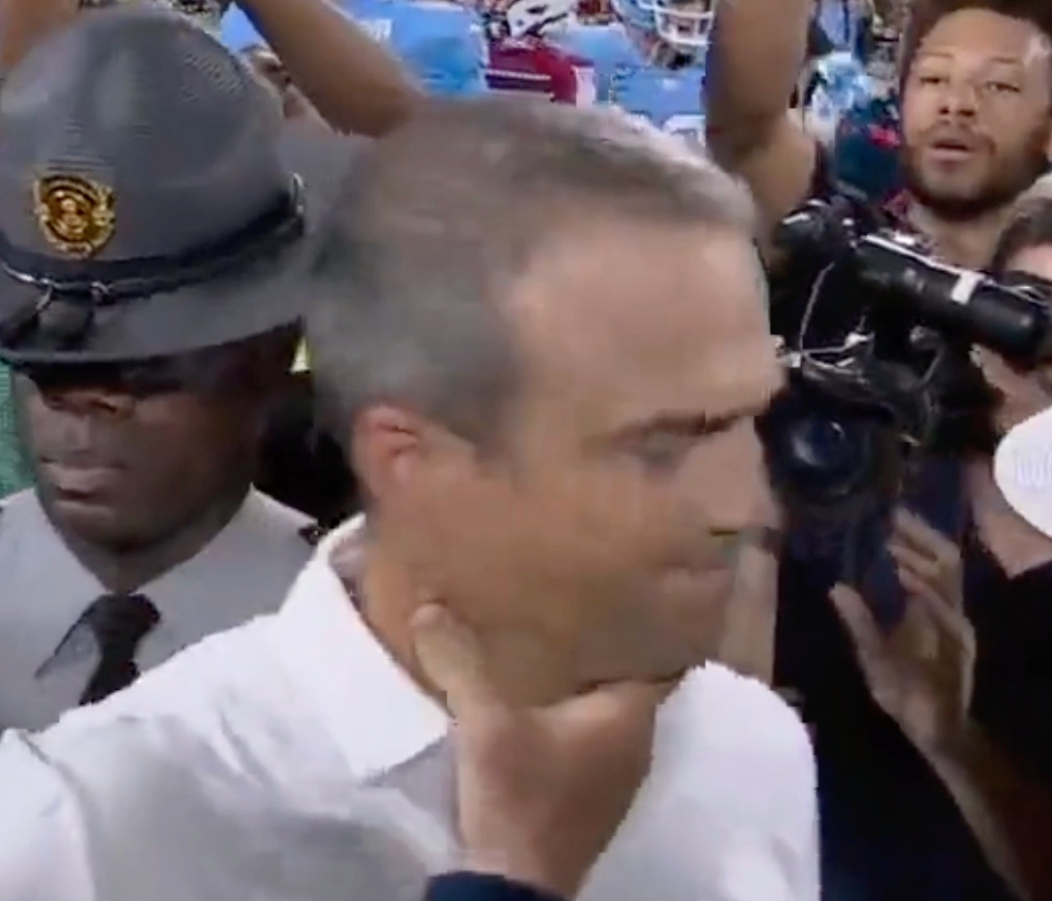 Coach Grabs Neck: North Carolina incident explained.